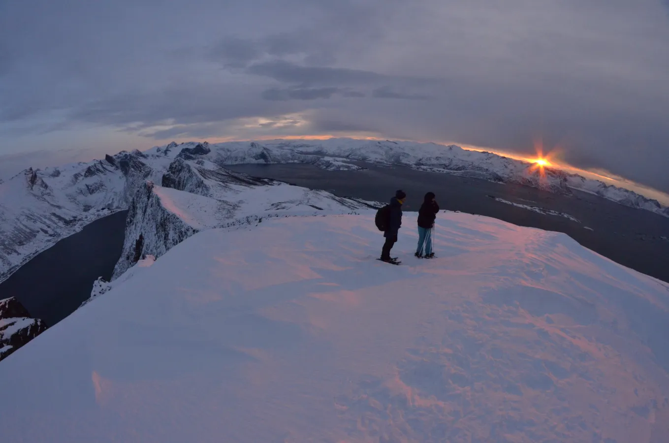 Snowshoeing winter sunset Hamn i Senja