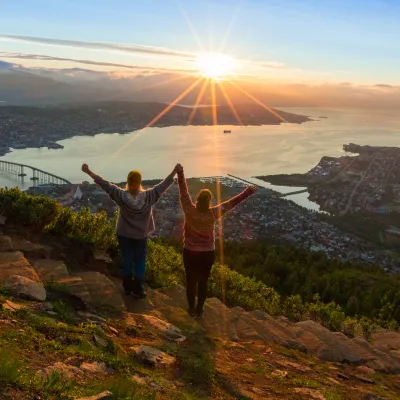 Girls enjoying the view over Tromsø from the Sherpa stairs