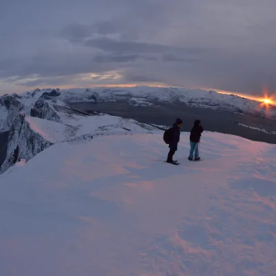 Snowshoeing winter sunset Hamn i Senja